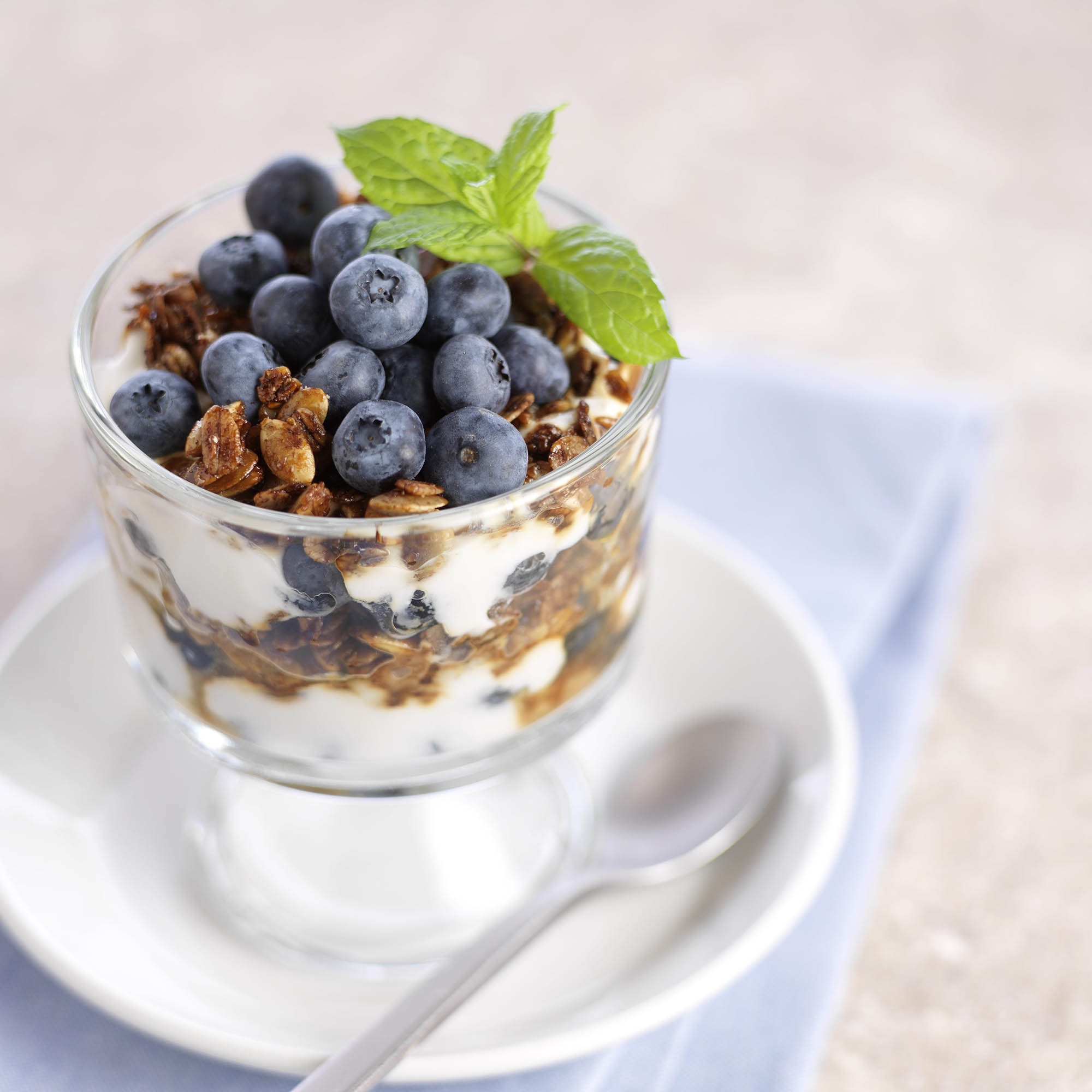 Parfait dessert with granola, blueberry, strawberry and yogurt