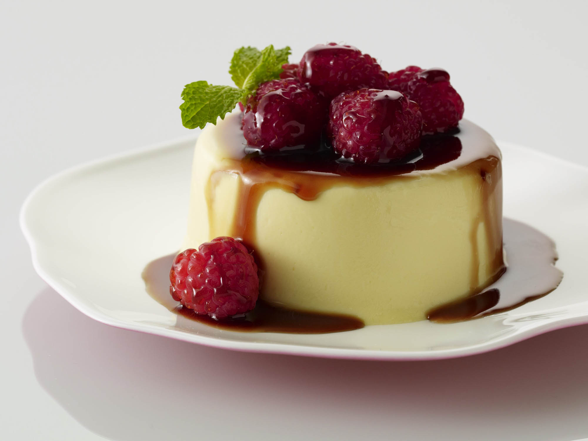 Eggnog panna cotta with balsamic raspberries