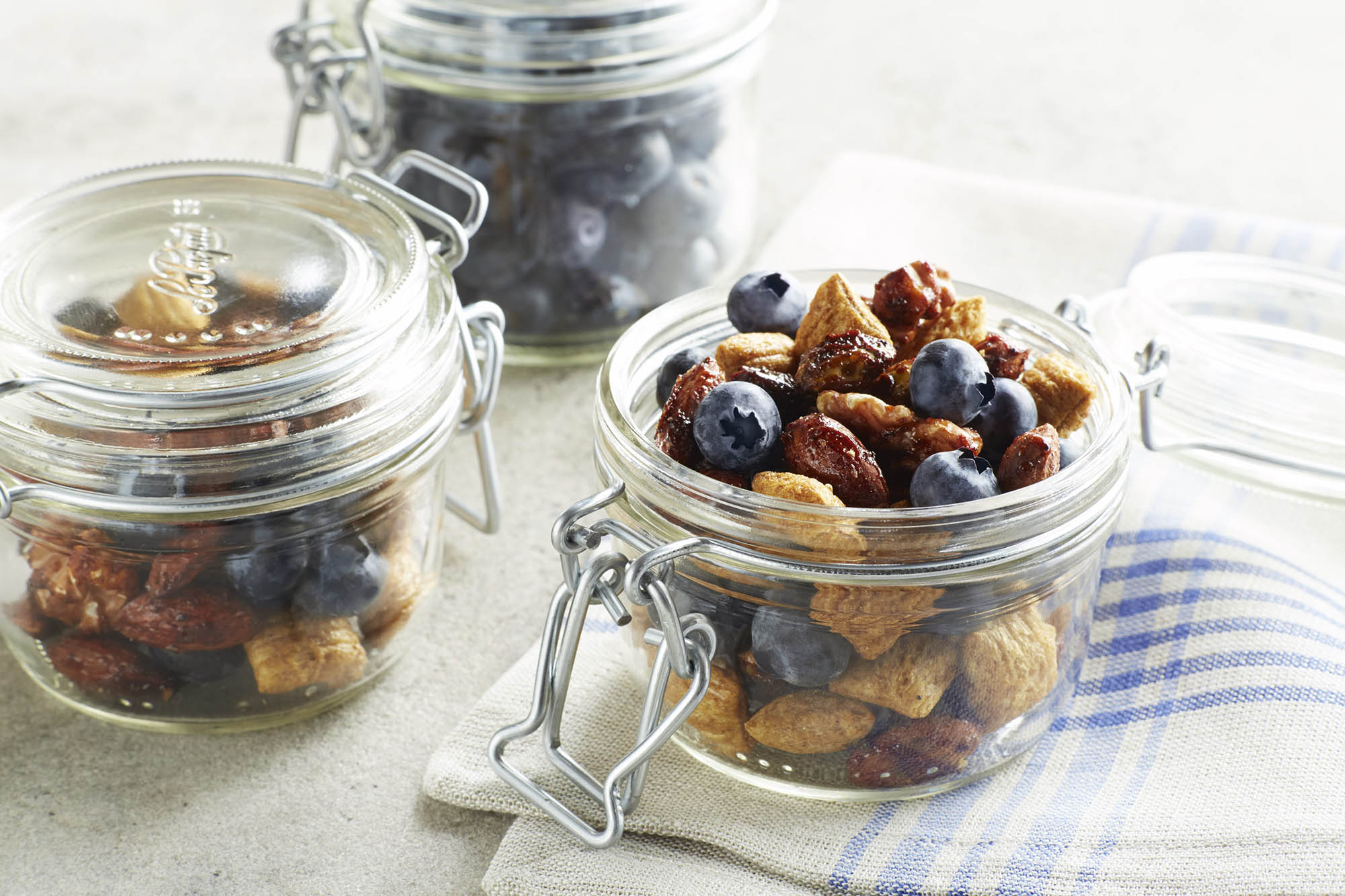Gluten free spicy blueberry trail mix in jars