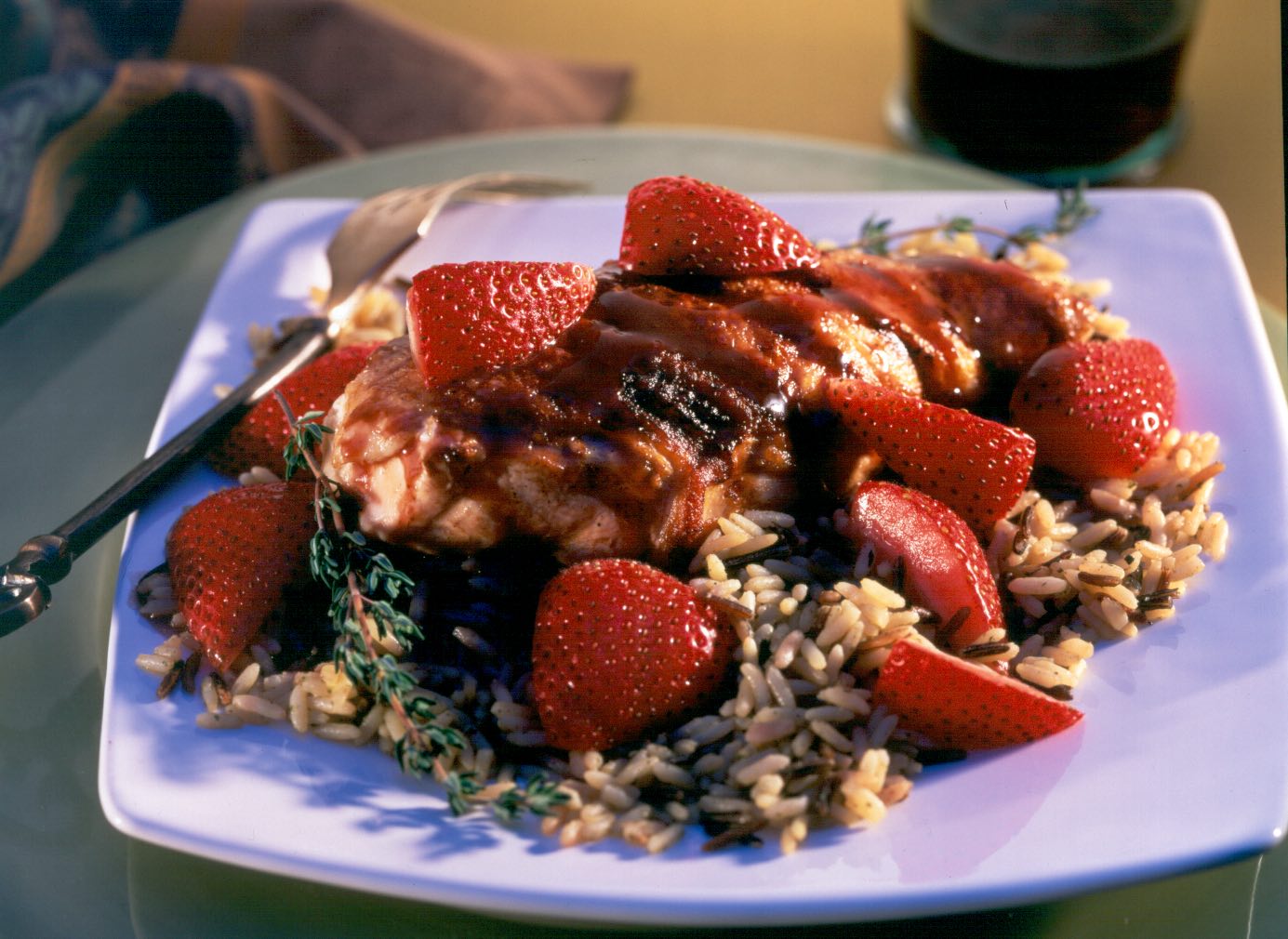 Grilled chicken breasts with strawberry red wine balsamic sauce
