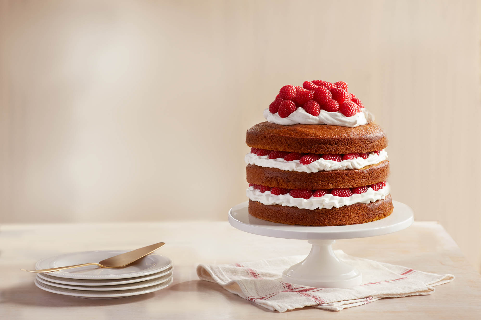 Pumpkin Layer Cake with Raspberries & Brandy Frosting | Driscoll's
