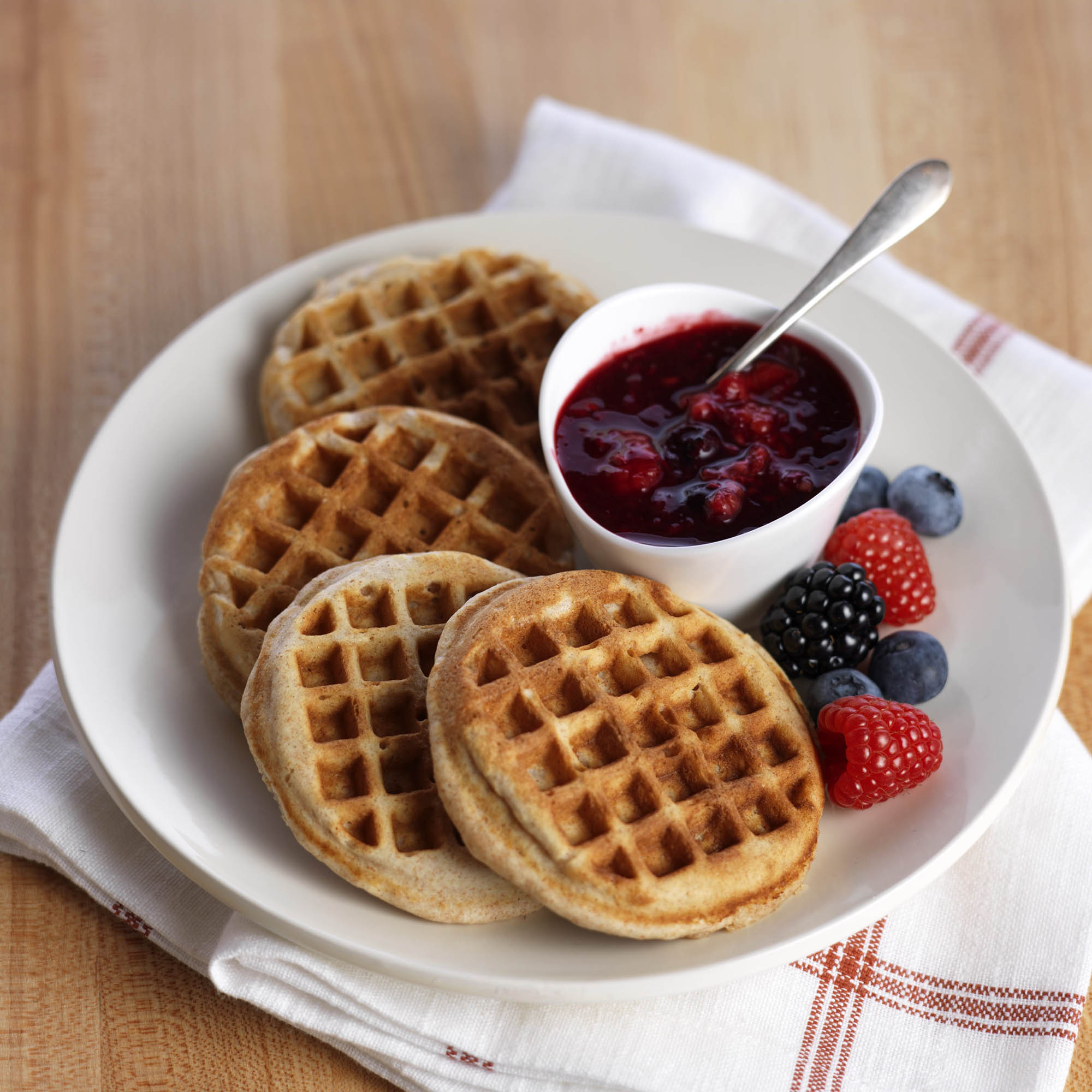 Whole Wheat Almond Waffles with Mixed Berry Sauce