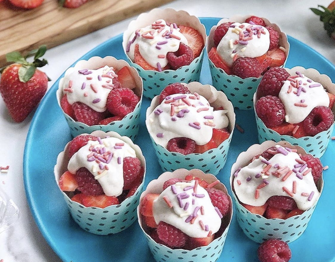 Cups of Driscoll's berries with whipped cream