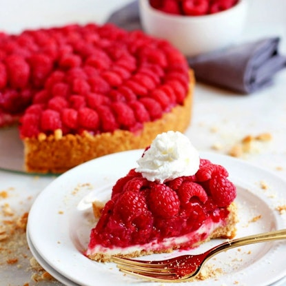Pie with raspberries on top